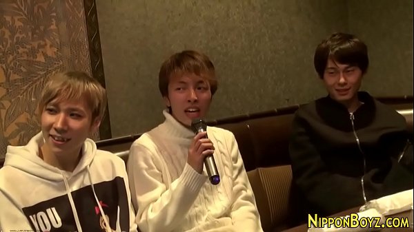 Three asian teenagers blow